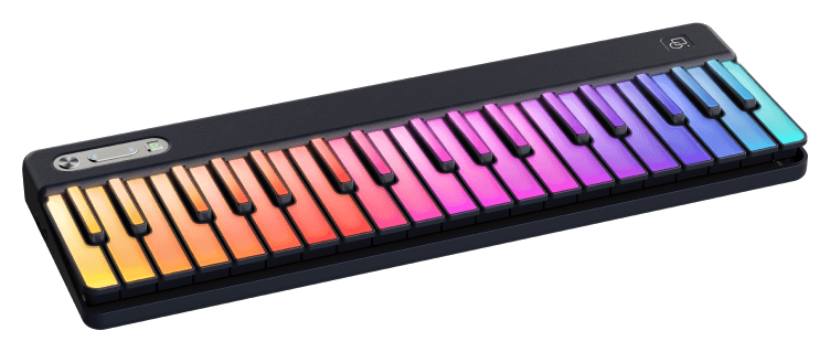 PartyKeys smart keyboard, keys glowing in a full-spectrum gradient